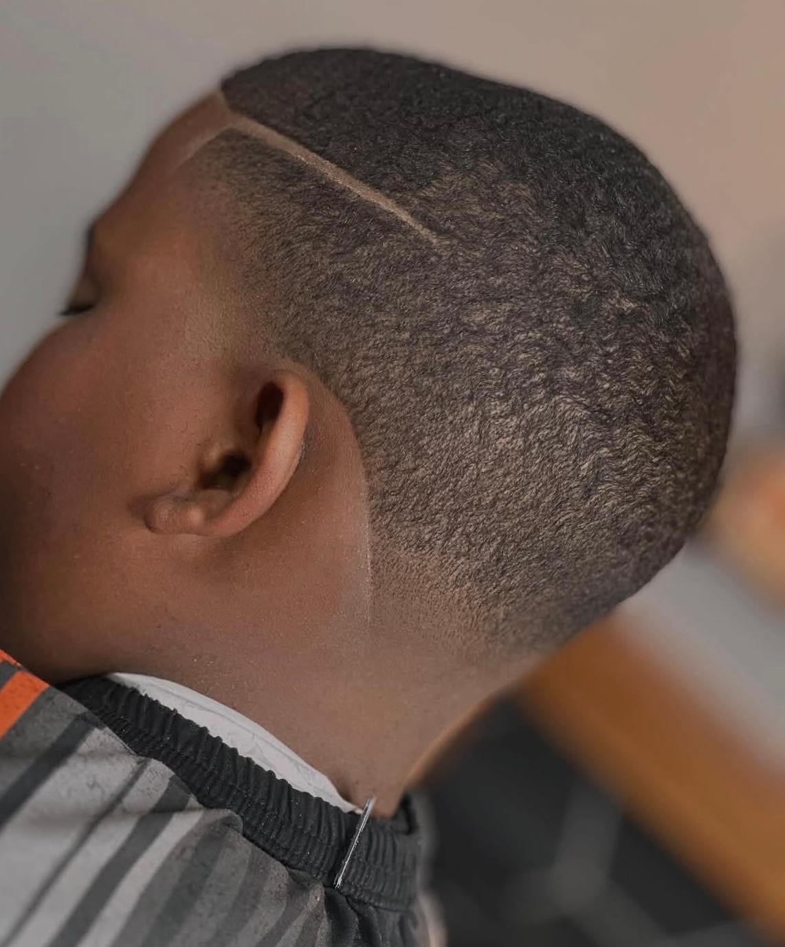 Clean skin fade close up by Alex Urbaez Barber